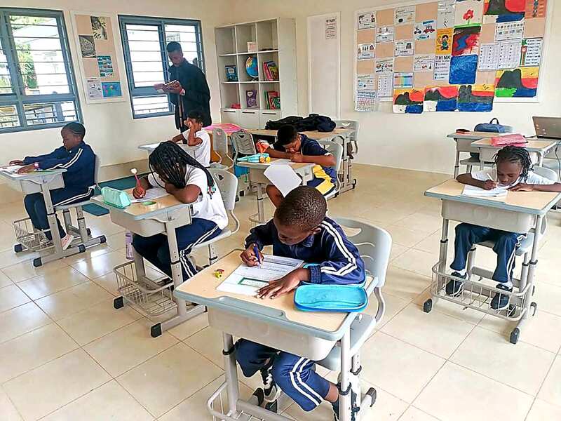 Junior Prep students at their classroom desks