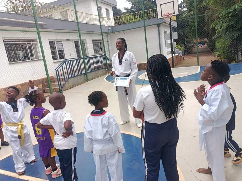 Students competing in athletics at Pink Tower International